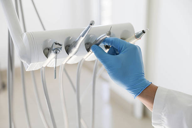 Professional Tooth Extraction technician working in Elon, NC